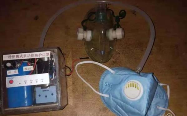 配備了空氣過濾器和擴音裝置的防病毒口罩 配備了空氣過濾器和擴音裝置的防病毒口罩